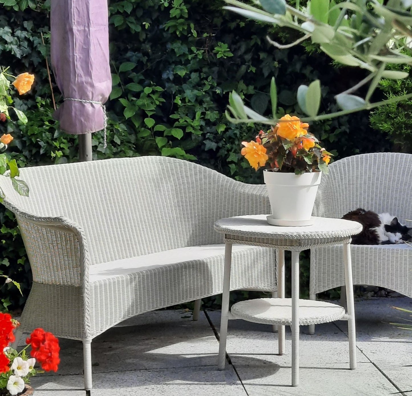 Lloyd Loom Outdoor Settee Finished in Crisp Linen